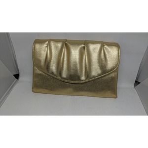 Vintage 1978 gold Leatherette Avon clutch “Polished Fold Evening Bag purse